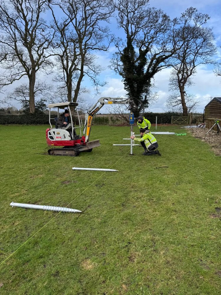 The team working on Solar PV installation at Caffi Wylfa