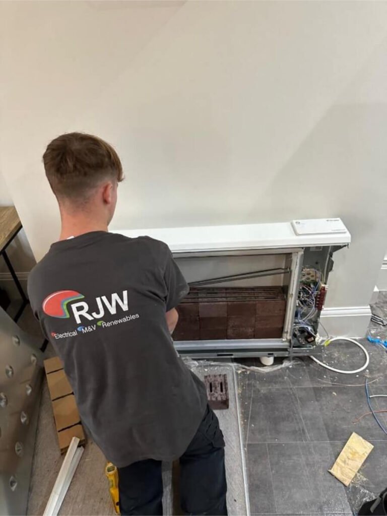 Josh Bowen carrying out practical electrical work in Shrewsbury